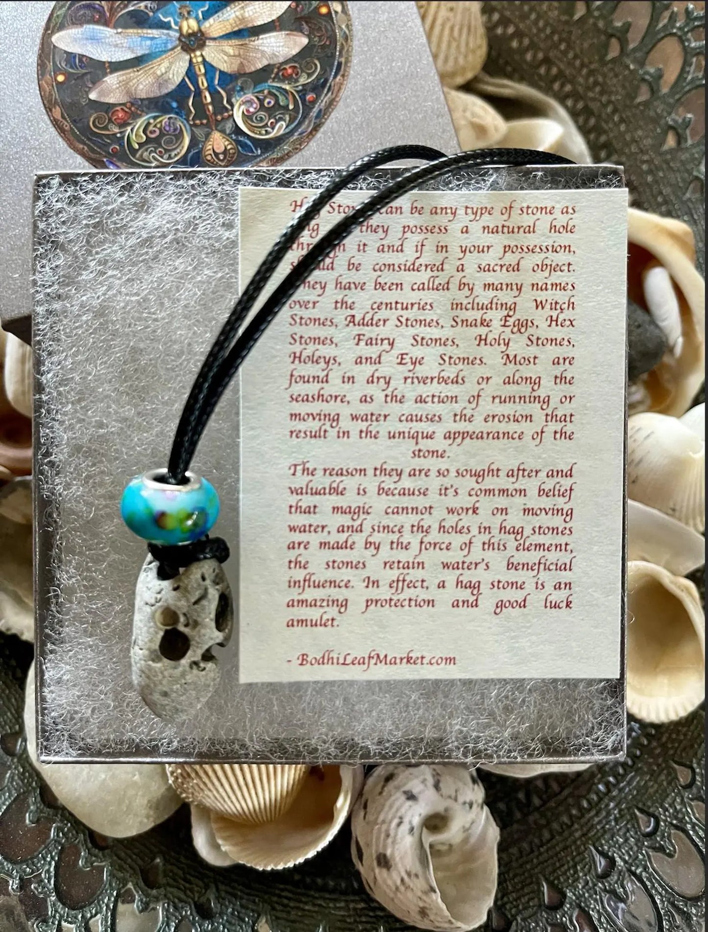 dragonfly, dragonflies, Bodhi Leaf Market, boxed dragonfly, dragonfly art, dragonfly pendant, made in USA, made in Florida, Florida beach stone, hagstone, hagstone pendant, good fortune gift, artisan pendant, hagstone description,