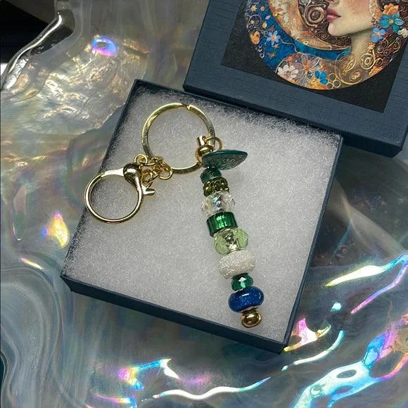 Elegant Gold Tone Beaded Keychain with Heart Charm Accent