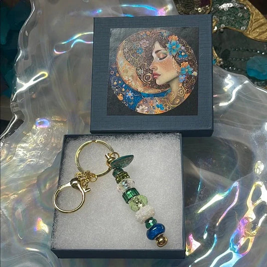 Elegant Gold Tone Beaded Keychain with Heart Charm Accent