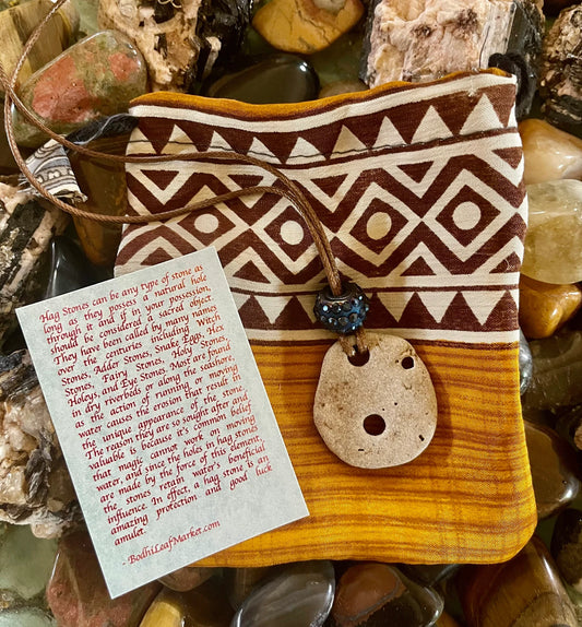 Spirited Bohemian Water Magic Amulet with Silk Pouch, Bodhi Jewelry, hag stone, odin stone, witch stone, beach stone, stone necklace