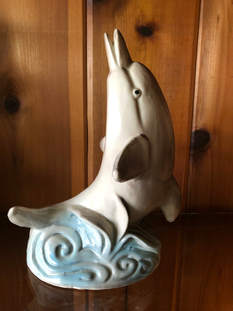 Vintage ceramic dolphin statue