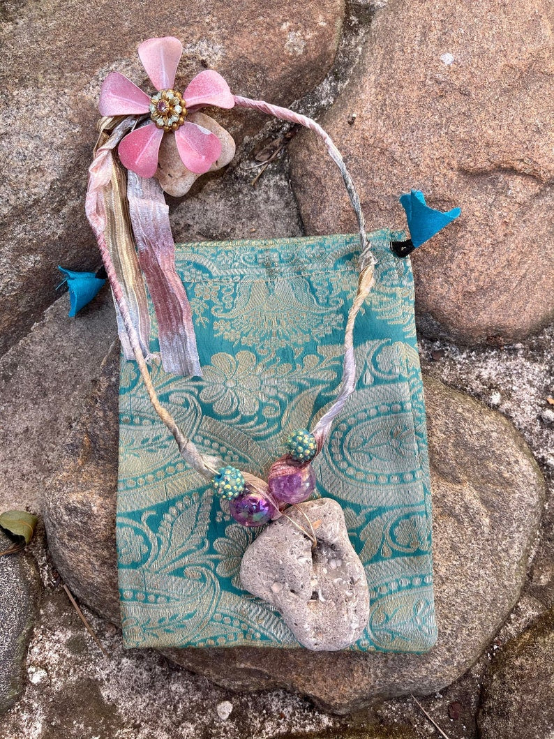 Spring Spirited Bohemian Hag Stone Amulet, Home Decor, Gift, boho stone, gypsy stone, stone gift, stone wall hanging, hag stone, odin stone, hex stone, silk pouch, stone hanging